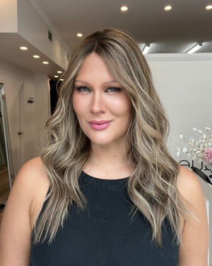 Woman with styled hair in an indoor setting
